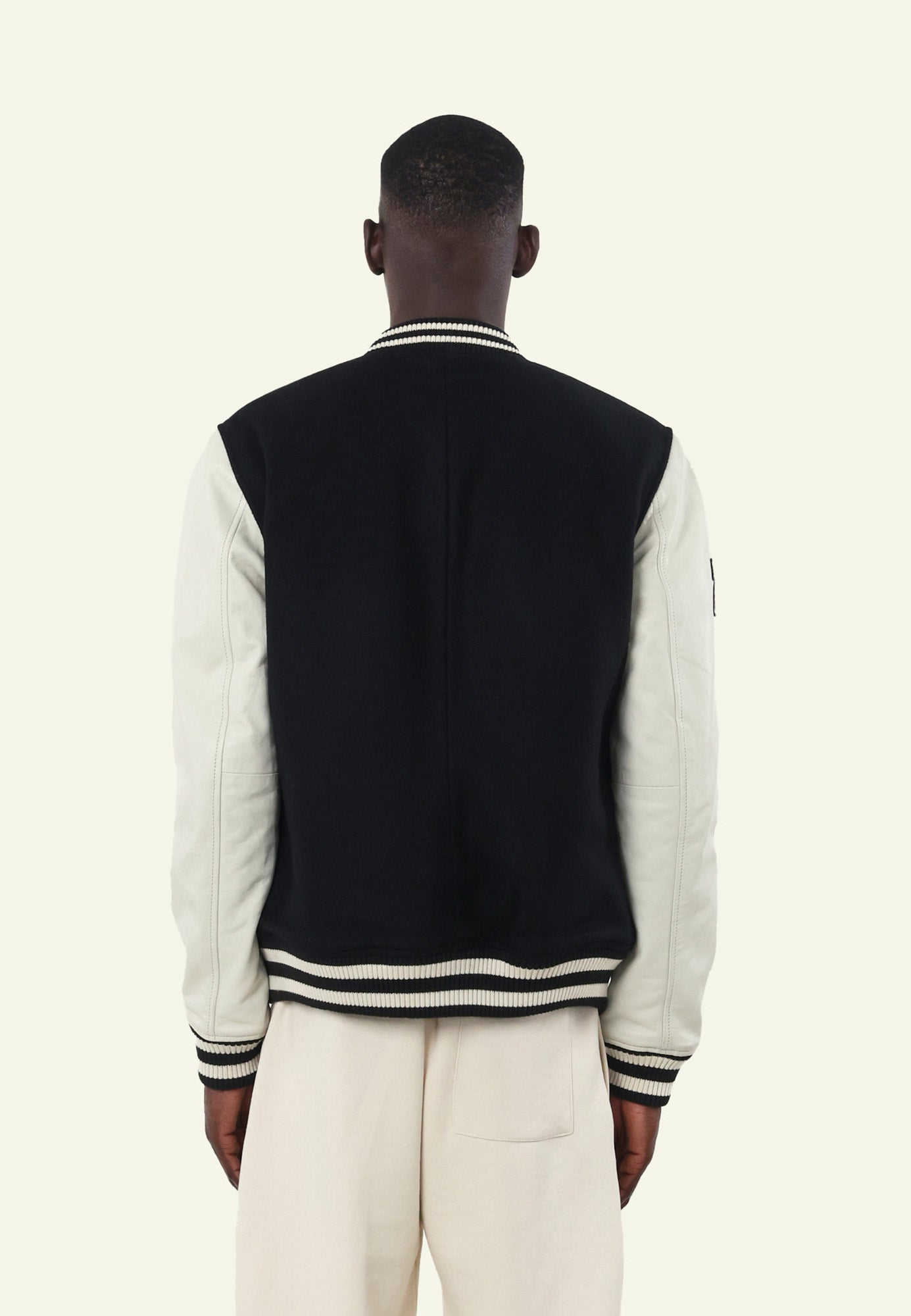 VARSITY BLACK WHITE porté homme blouson varsity cuir — Serge Pariente