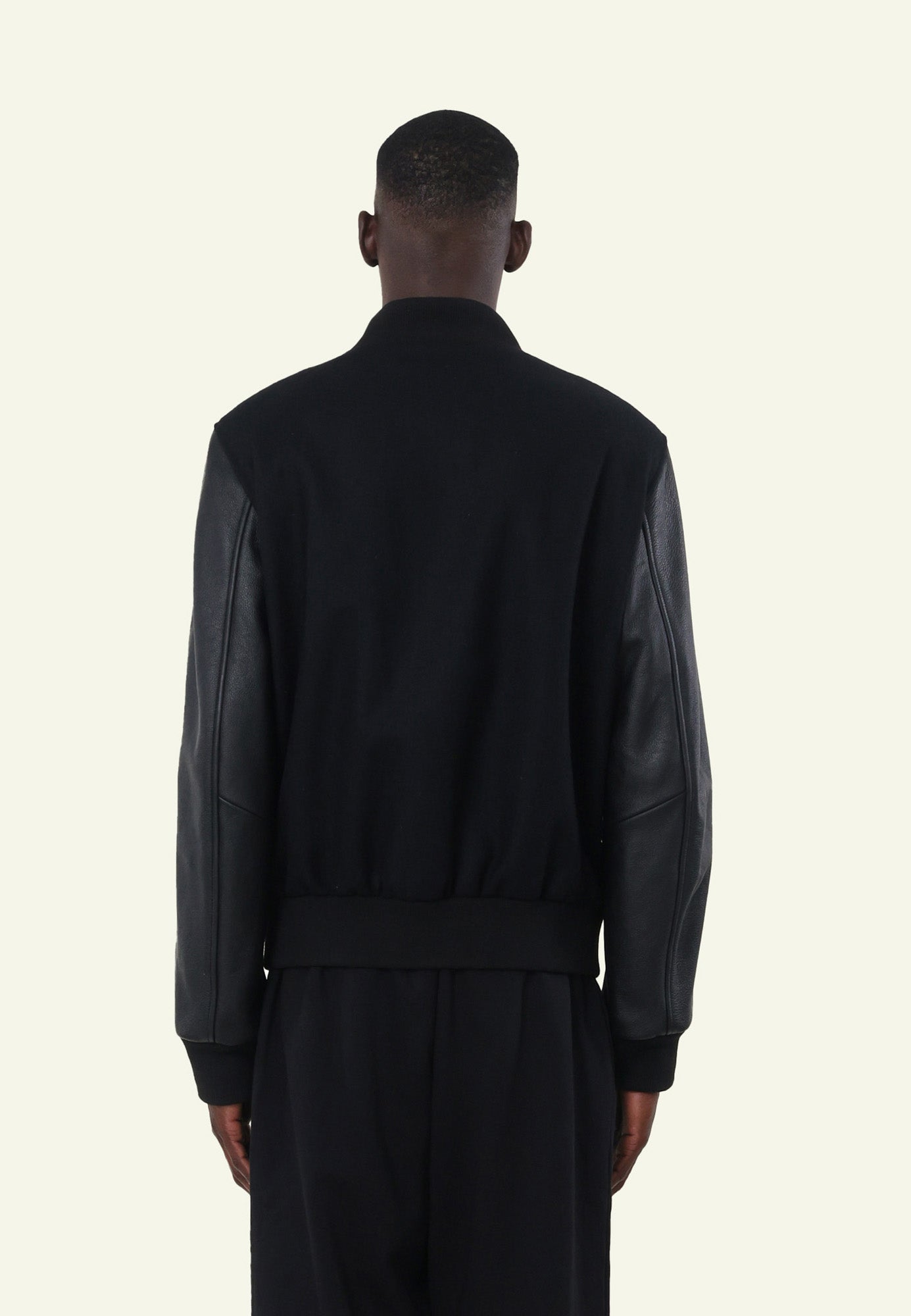 VARSITY ID BLACK porté homme blouson varsity cuir — Serge Pariente Paris