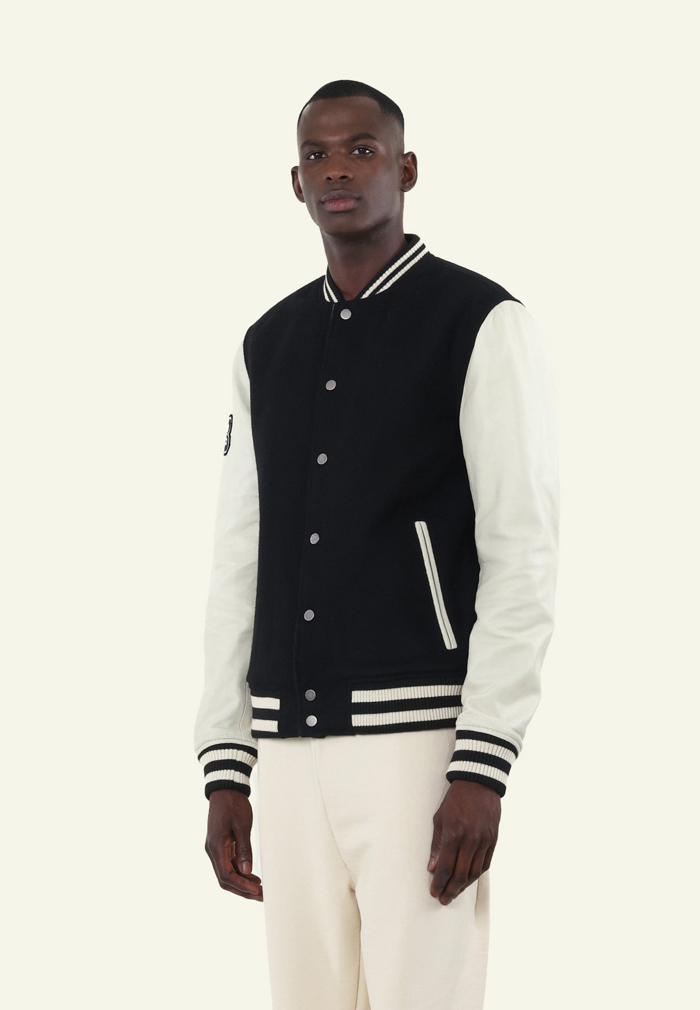 Blouson varsity VARSITY BLACK WHITE vue côté — Serge Pariente Paris